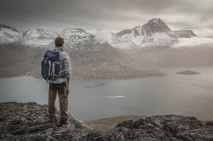 A hiker overlooking Kobberfjorden near Nuuk in Greenland - photo by Mads Pihl